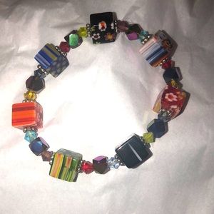 Cute stretch bracelet with different designed beads.